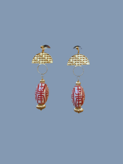 Statement Modern Design Golden Stud Earrings with Hand Painted Ceramic Ancient Character of Long-Life Beads